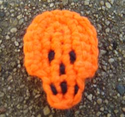 OrangeSkullMag250.jpg